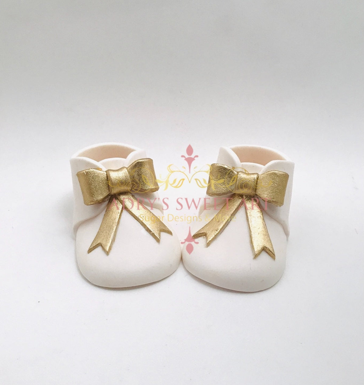 White Baby Boots with Gold Bow Gum Paste Cake Topper