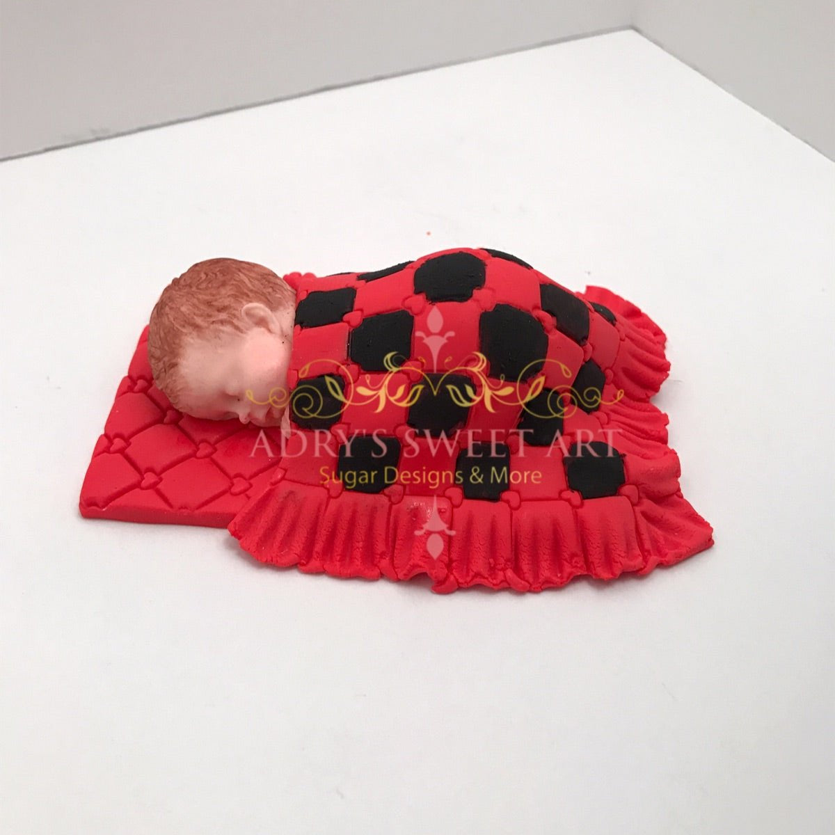 Copy of Gum Paste Baby Boy with a Checkered Blanket Cake Topper - Adry’s Sweet Art