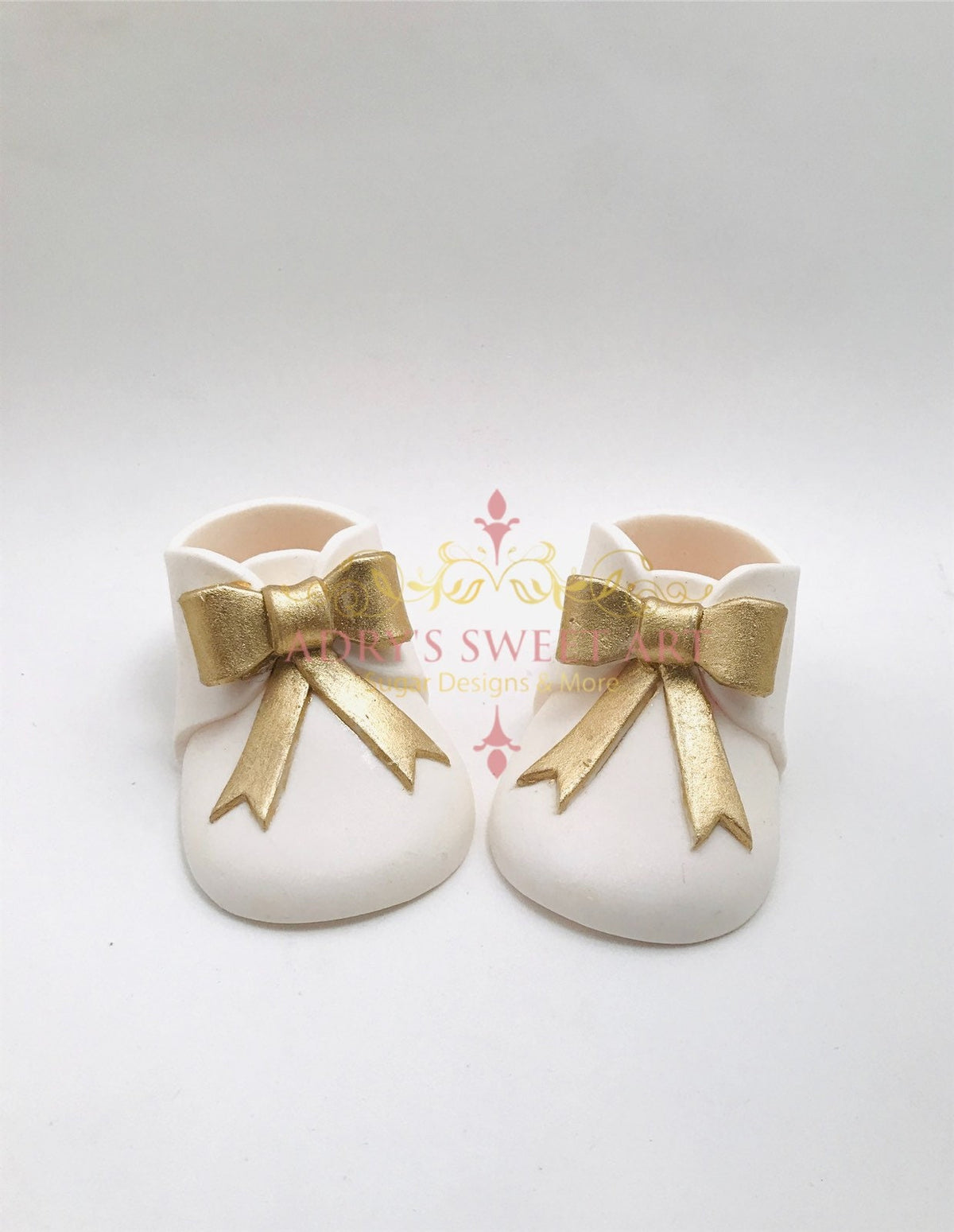 White Baby Boots with Gold Bow Gum Paste Cake Topper