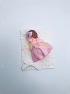 Gum Paste Baby Girl on a Blanket Cake Topper - Adry’s Sweet Art